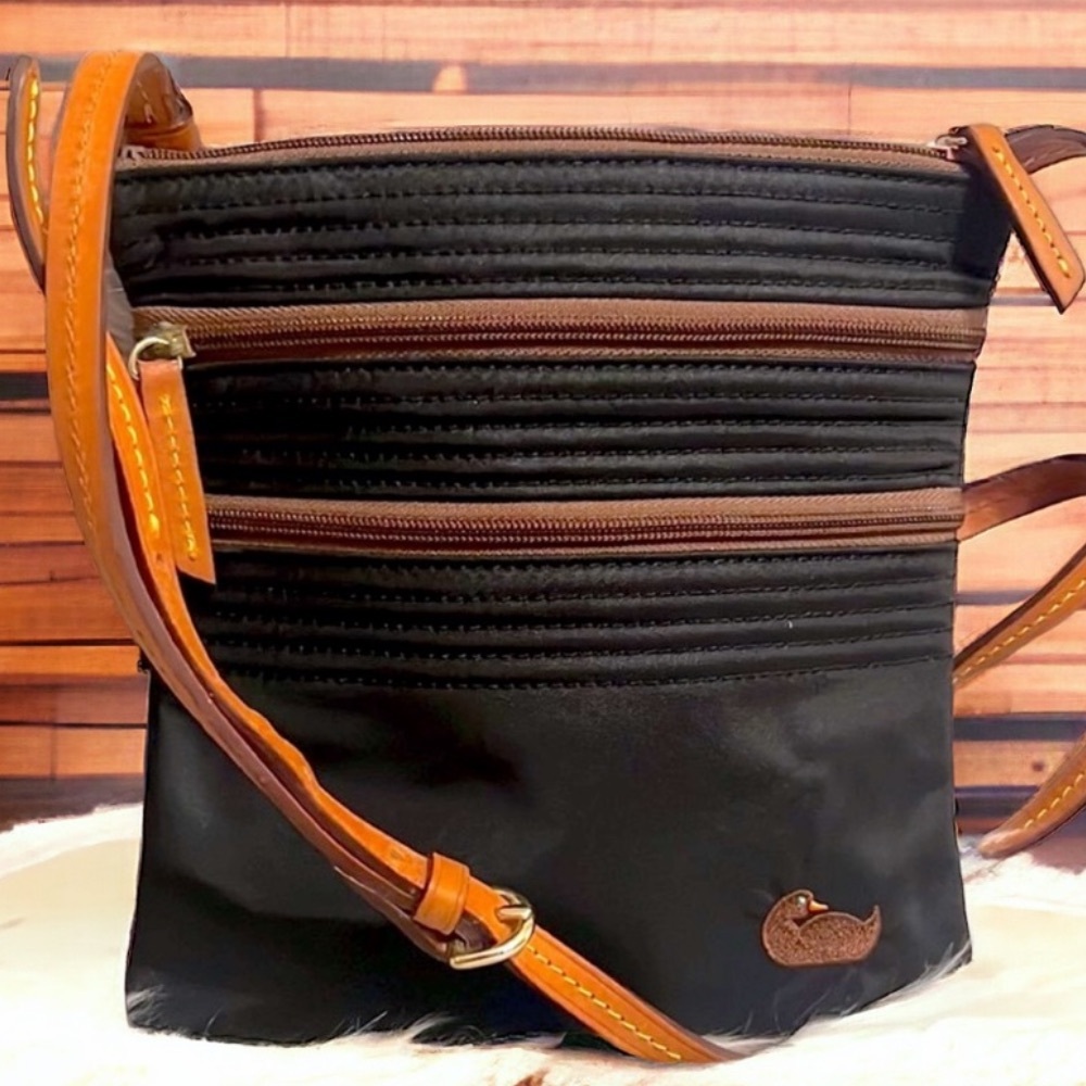 Dooney and Bourke black nylon  3 zip  crossbody bag like new